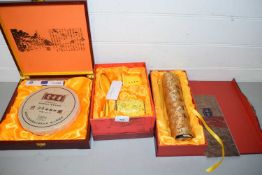 Boxed Jinrich Chinese tea block together with a further modern Chinese scroll picture and a boxed