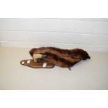 Deers foot coat hook together with a mink collar