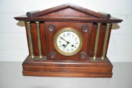 Late 19th/early 20th Century mantel clock in mahogany architectural case with pillared detail