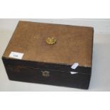 Leather mounted box containing a collection of various world coinage and quantity of bank notes,