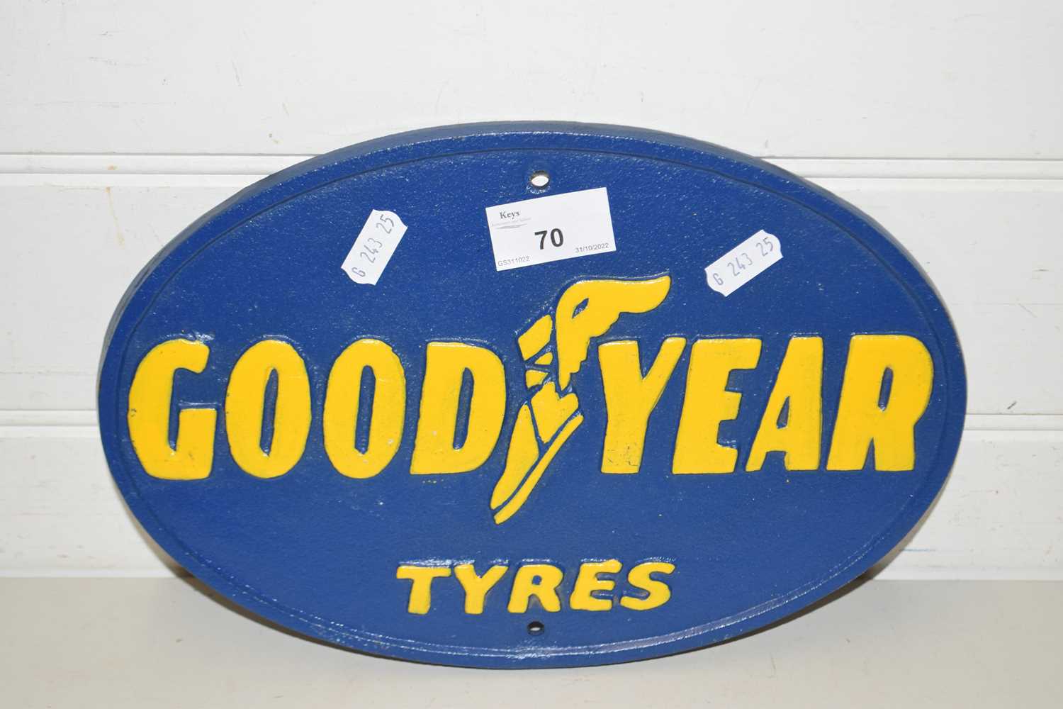 Cast iron wall plaque marked Goodyear Tyres
