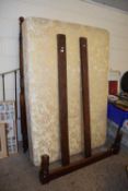 Disassembled mahogany bed frame with barley twist uprights