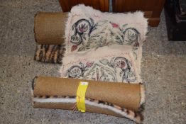 Pair of tiger stripe rugs together with a felted wool rug