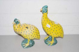 Pair of Italian yellow glazed pottery models of guinea fowl