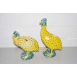 Pair of Italian yellow glazed pottery models of guinea fowl