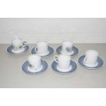 Six Suzie Cooper coffee cans and saucers