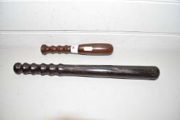 Two wooden truncheons