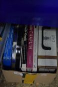 Box of Laurel & Hardy and Charlie Chaplin related DVD's, books etc
