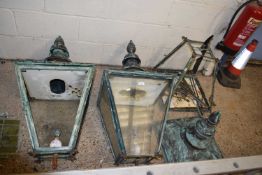 Three metal lanterns with verdigris finish, sold for repair