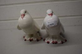 Two pottery model pigeons