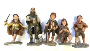 A collection of small Danbury Mint Lord of the Rings figurines in original boxes, to include: -
