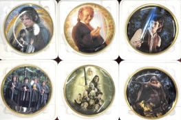 A collection of Danbury Mint Lord of the Rings collectors plates in original boxes with