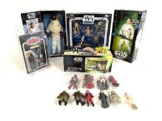A mixed lot of 1990s - early 2000s Star Wars action figures by Kenner and others to include: - A