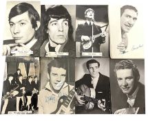 A large quantity of black and white postcards depictibg 1960s rock 'n' roll stars (many duplicates),
