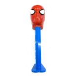 A novelty extra large musical Pez dispenser, modelled as The Amazing Spider-Man. Size