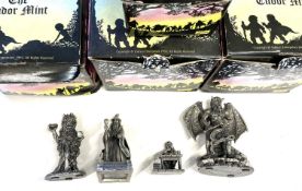 A collection of small Tudor Mint Lord of the Rings figurines in original boxes, to include: -