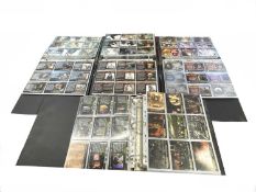 Mixed lot of folios containing a large quantity of Topps Lord of the Rings collectible cards.