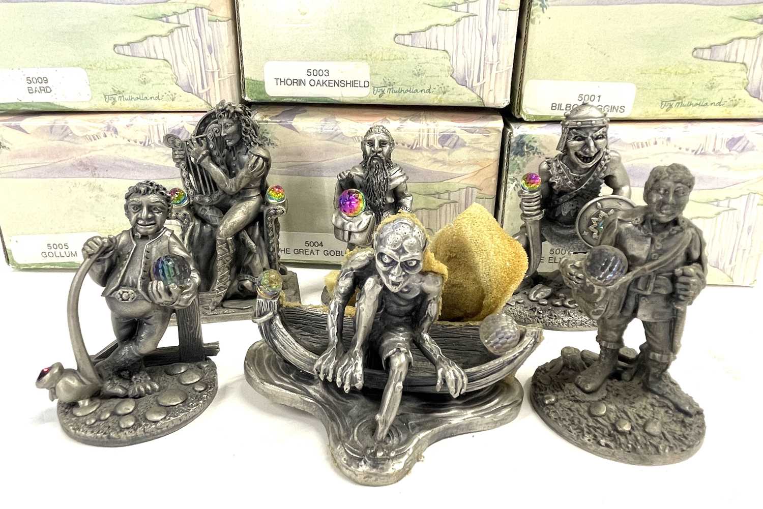 A collection of small Tudor Mint The Hobbit pewter figures in original boxes, to include: - Peregrin