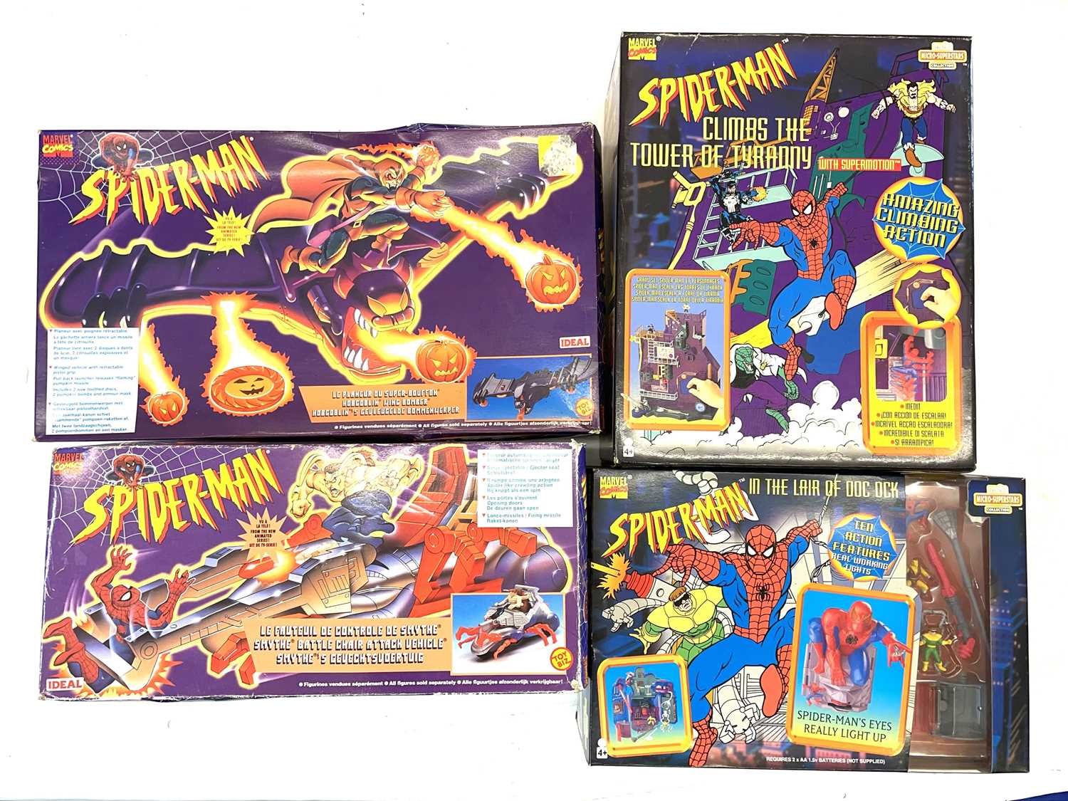 A mixed lot of vintage collectible 1990s boxed Spider-Man playsets (unchecked for completeness),