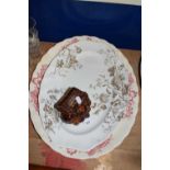 Two meat plates and a sash window stay