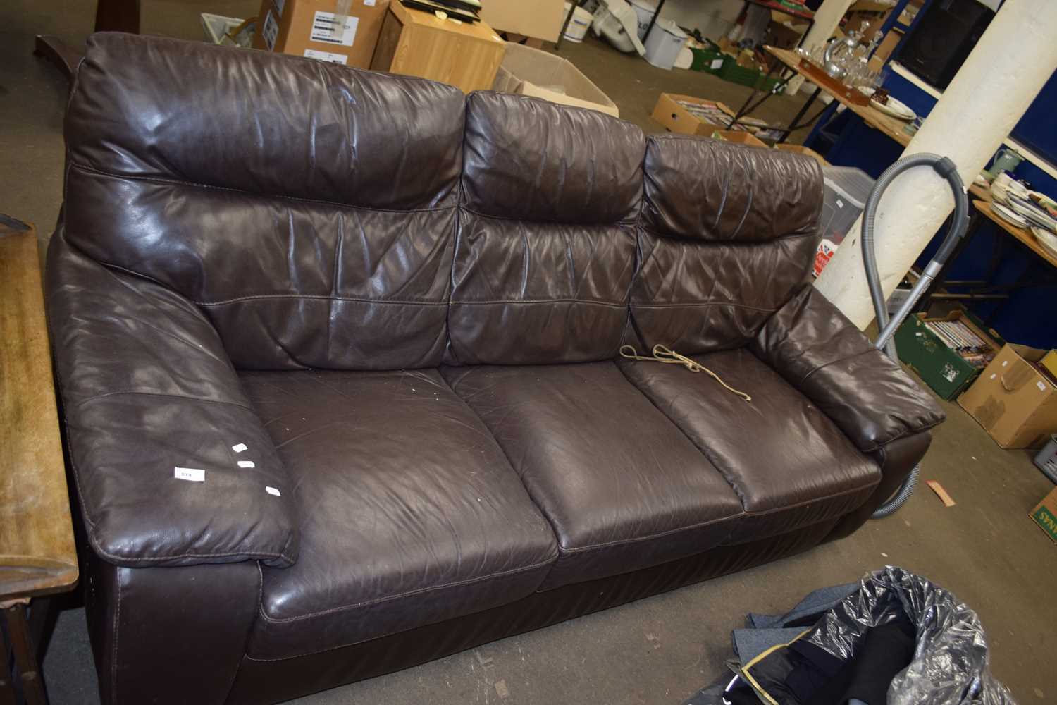 BROWN LEATHER THREE SEATER SOFA