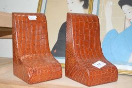 Asprey, London, a pair of crocodile skin effect bookends