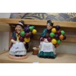 Collection of three Royal Doulton figures, The Old Balloon Seller, Balloon Girl and The Balloon