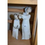 Two Lladro figures of a girl and a boy