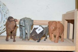 Mixed Lot: Two model elephants, model camel and a bison