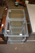 Pair of three tier glass occasional tables