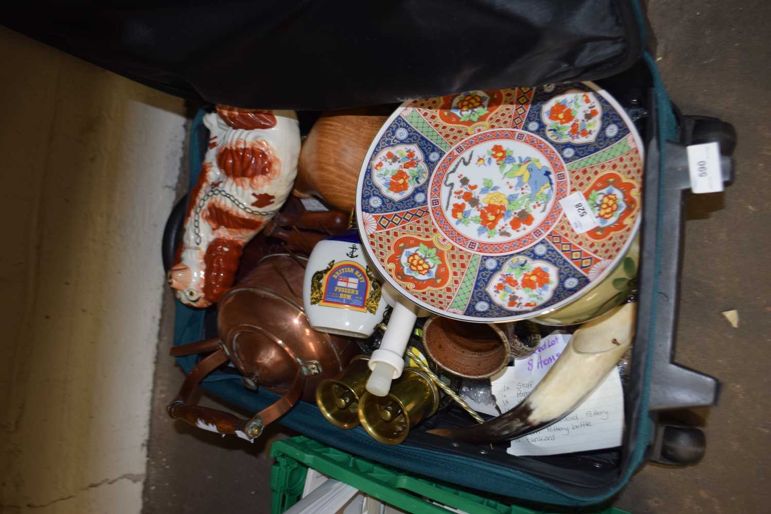 Suitcase containing mixed items to include copper kettle, Staffordshire model dog and other assorted