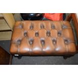 Brown leather upholstered footstool