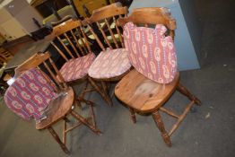 Set of four pine kitchen chairs