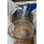 Clear glass jug and circular bowl plus two kitchen dishes