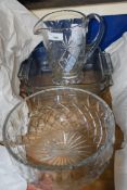 Clear glass jug and circular bowl plus two kitchen dishes