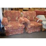 Pair of red upholstered armchairs