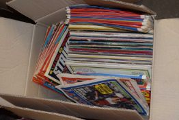 One box of various assorted records and football magazines