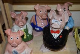 Set of five Wade Nat West piggy banks