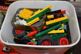 Box of plastic construction toys