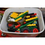 Box of plastic construction toys