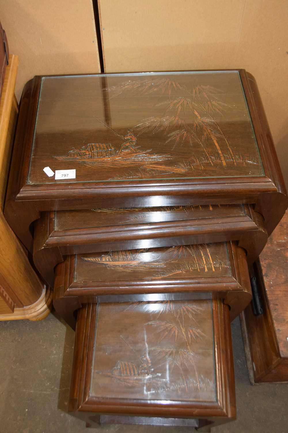 Nest of four modern Chinese hardwood occasional tables