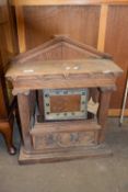 20th Century mantel clock set in a large oak architectural mount