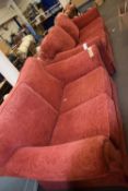Modern red upholstered three seater sofa and matching two seater sofa