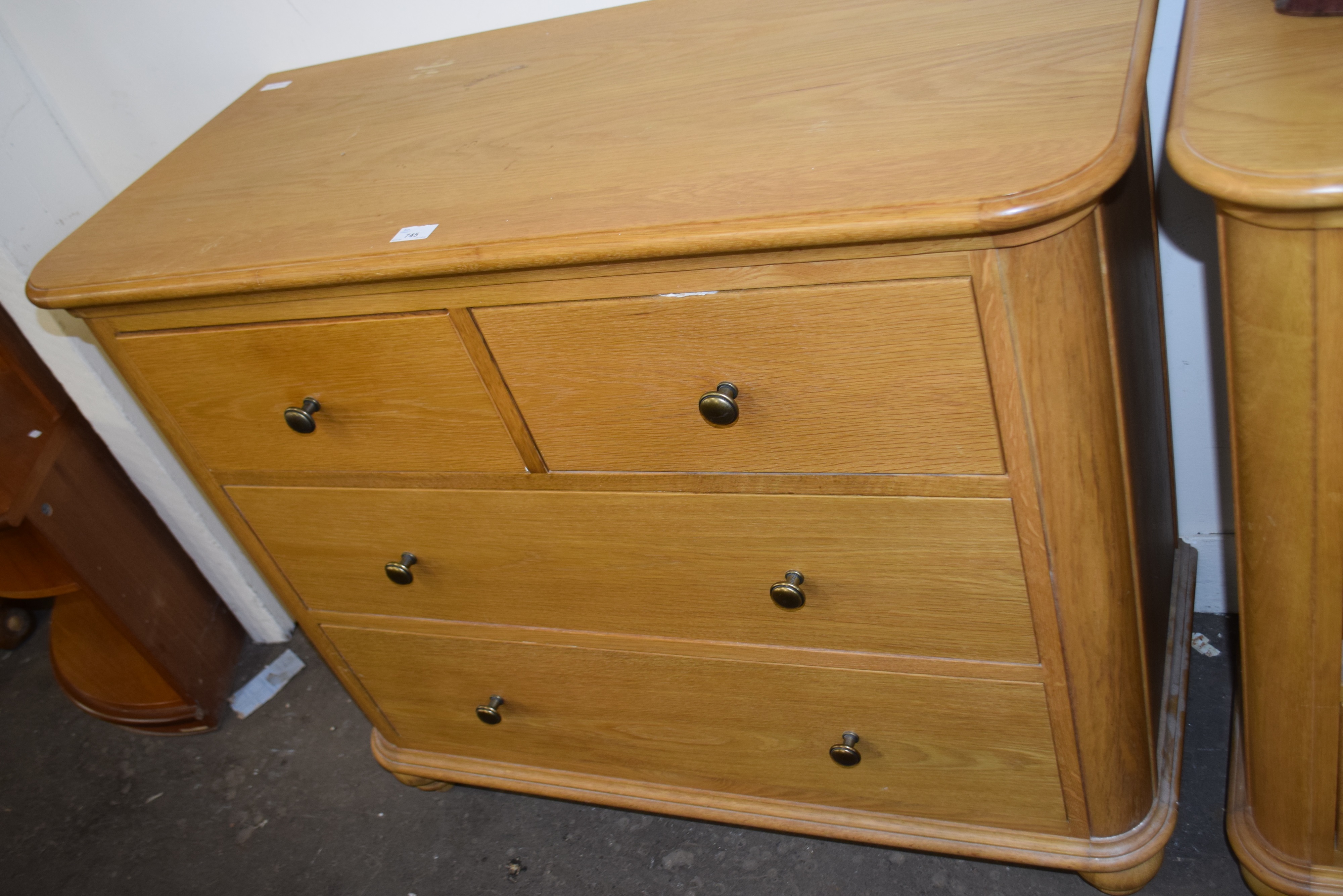 Modern light oak four drawer bedroom chest, 109cm wide