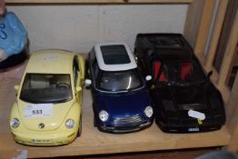 Three model cars to include Burago