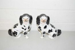 Pair of Staffordshire black and white Spaniels