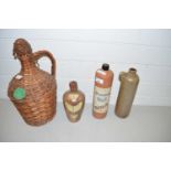 Mixed Lot: Wicker cupboard, demi john and pottery gin bottles