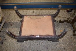 Unusual leather upholstered stool