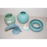 A collection of Poole pottery items to include vases, crocus planter, leaping salmon etc