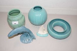 A collection of Poole pottery items to include vases, crocus planter, leaping salmon etc